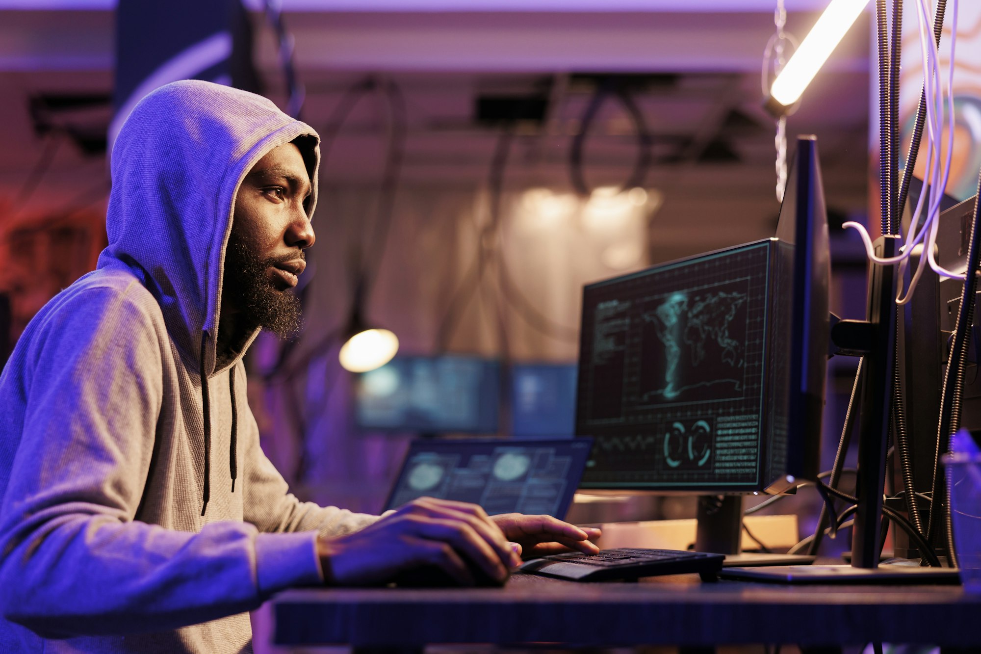 Hacker breaching cybersecurity system